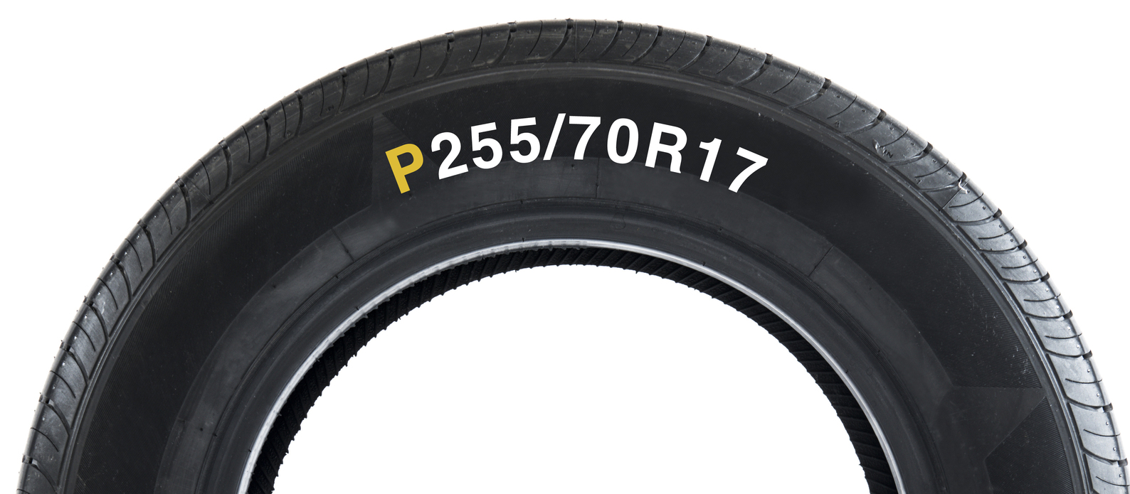 Sidewall of a tire with tire size showing.